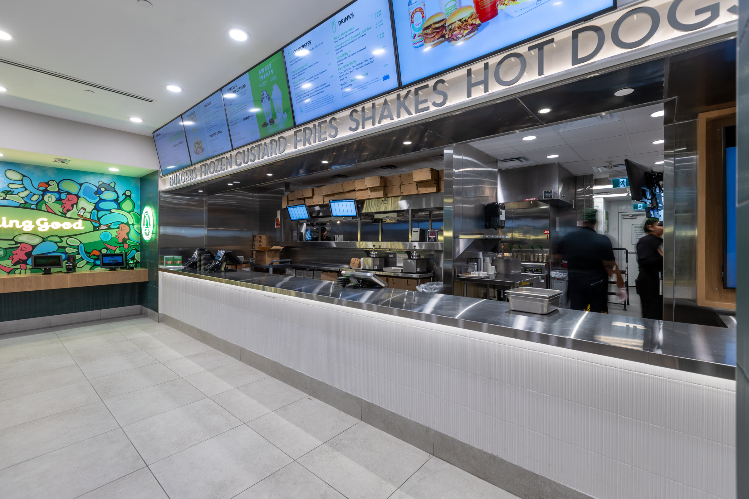 Shake Shack Square One service counter with stainless equipment behind the line